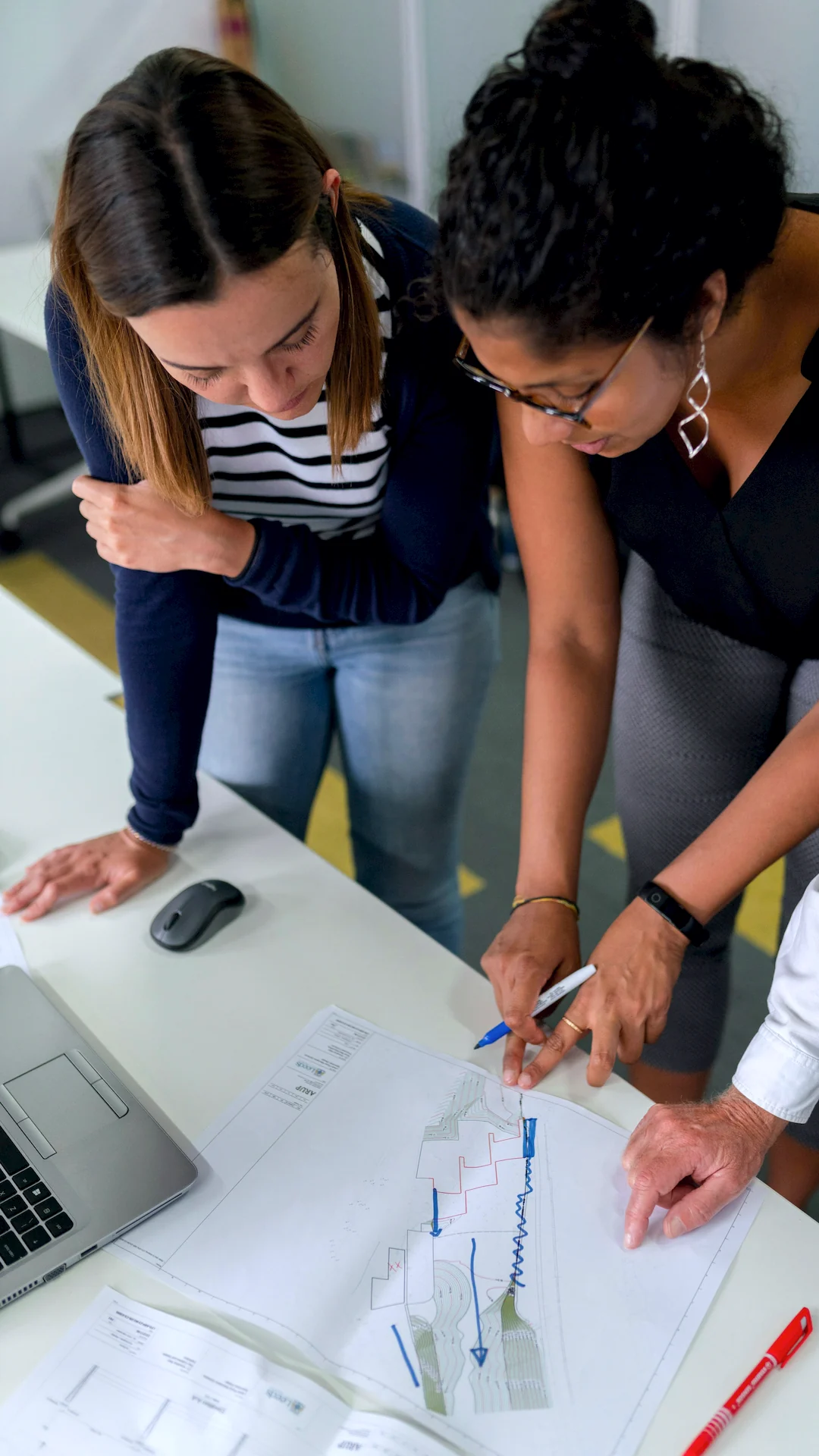 Colleagues planning together at a table